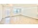 Bright and airy living room with tile floors and neutral walls at 340 Banished Ave # 2, North Las Vegas, NV 89031