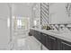 Modern bathroom with double vanity and geometric tile at 371 Tranquil Peak Ct, Henderson, NV 89012