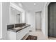 Bathroom featuring double vanity, modern fixtures, and bright white finishes at 371 Tranquil Peak Ct, Henderson, NV 89012