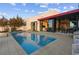 Modern home exterior with sleek lines and red accents at 371 Tranquil Peak Ct, Henderson, NV 89012