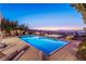 Stunning pool and patio area with mountain views at 371 Tranquil Peak Ct, Henderson, NV 89012