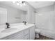 Bathroom with double vanity, tub, and modern fixtures at 3748 Honey Crest Dr, Las Vegas, NV 89135