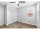 Bedroom with double door closet and wood-look flooring at 3748 Honey Crest Dr, Las Vegas, NV 89135