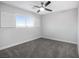 Well lit bedroom with ceiling fan and window shutters at 3748 Honey Crest Dr, Las Vegas, NV 89135