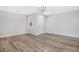 Bright dining room with hardwood floors and neutral walls at 3748 Honey Crest Dr, Las Vegas, NV 89135