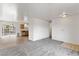 Open concept dining room with wood-look flooring and a view of the kitchen at 392 Dooley Dr, Henderson, NV 89015