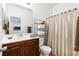 Clean bathroom with dark wood vanity and shower at 3920 Red Trumpet Ct, North Las Vegas, NV 89081