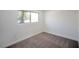 Well-lit bedroom with carpet and window at 3950 Ventura Way, Las Vegas, NV 89121