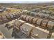 Aerial view of townhouses with community pool and surrounding landscape at 4039 Halfmoon Bay Dr, Las Vegas, NV 89115