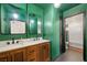 Modern bathroom with double vanity and a walk-in shower at 4039 Halfmoon Bay Dr, Las Vegas, NV 89115