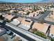 Aerial view of a house with solar panels and a backyard at 4313 Beach Cliff Ave, North Las Vegas, NV 89031