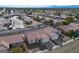 Aerial view of houses with mountain views in the background at 4313 Beach Cliff Ave, North Las Vegas, NV 89031