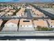 Aerial view of a house with solar panels and a backyard at 4313 Beach Cliff Ave, North Las Vegas, NV 89031