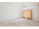 Bright and airy bedroom with carpeted floors and window at 4313 Beach Cliff Ave, North Las Vegas, NV 89031