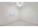 Well-lit bedroom featuring a ceiling fan and window coverings at 4313 Beach Cliff Ave, North Las Vegas, NV 89031