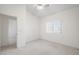 Spacious bedroom with ceiling fan and access to another room at 4313 Beach Cliff Ave, North Las Vegas, NV 89031