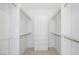 Large walk-in closet with double hanging rods and shelving at 4313 Beach Cliff Ave, North Las Vegas, NV 89031