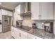 Modern kitchen with stainless steel appliances and granite countertops at 4417 S Grand Cypress Way, Pahrump, NV 89061