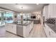 Spacious kitchen with island, stainless steel appliances, and granite countertops at 4417 S Grand Cypress Way, Pahrump, NV 89061