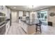 Modern kitchen with large island and stainless steel appliances at 4417 S Grand Cypress Way, Pahrump, NV 89061