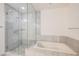 Spa-like bathroom with a soaking tub and glass shower at 4575 Dean Martin Dr # 1108, Las Vegas, NV 89103