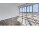 Bright bedroom with hardwood floors and city views at 4575 Dean Martin Dr # 1108, Las Vegas, NV 89103