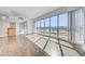 Sunlit living room featuring hardwood floors and expansive windows at 4575 Dean Martin Dr # 1108, Las Vegas, NV 89103