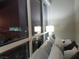 Bedroom with city view and comfortable seating at 4575 Dean Martin Dr # 2001, Las Vegas, NV 89103