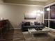 Spacious living room with hardwood floors and large windows at 4575 Dean Martin Dr # 2001, Las Vegas, NV 89103