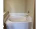 Bathroom with soaking tub and tile surround at 5650 E Sahara Ave # 2029, Las Vegas, NV 89142