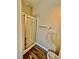 Bathroom with shower/tub combo and wood-look floors at 5650 E Sahara Ave # 2029, Las Vegas, NV 89142