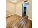 Bedroom with wood-look floors and access to bathroom at 5650 E Sahara Ave # 2029, Las Vegas, NV 89142