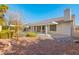 Backyard with patio cover and gravel landscaping at 5728 Palma Del Sol Way, Las Vegas, NV 89130