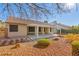 Backyard with patio cover and gravel landscaping at 5728 Palma Del Sol Way, Las Vegas, NV 89130