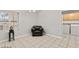 Dining area with tile floors and a leather chair at 5728 Palma Del Sol Way, Las Vegas, NV 89130