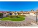 Single-story house with landscaped lawn and two-car garage at 5728 Palma Del Sol Way, Las Vegas, NV 89130