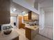 Spacious kitchen featuring wood cabinets and tile flooring at 5728 Palma Del Sol Way, Las Vegas, NV 89130