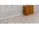 Living room showcasing tile floors and wood cabinet at 5728 Palma Del Sol Way, Las Vegas, NV 89130