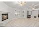 Living room with fireplace and tiled floors at 5728 Palma Del Sol Way, Las Vegas, NV 89130