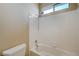 Clean bathroom with a shower/tub combo and tile surround at 5892 Rothbury Ave, Las Vegas, NV 89141