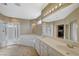 Double vanity bathroom with soaking tub and shower at 5892 Rothbury Ave, Las Vegas, NV 89141