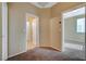 Upper level hallway with carpet and access to bedrooms and bathrooms at 5892 Rothbury Ave, Las Vegas, NV 89141