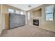 Living room with fireplace and neutral color scheme at 5892 Rothbury Ave, Las Vegas, NV 89141