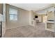 Open living area with built-in shelving and fireplace at 5892 Rothbury Ave, Las Vegas, NV 89141