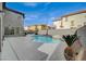 Inviting backyard oasis with a sparkling pool and spa at 5892 Rothbury Ave, Las Vegas, NV 89141