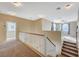 Upstairs loft area with carpeted floors and window at 5892 Rothbury Ave, Las Vegas, NV 89141