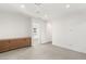 Versatile bonus room with wood cabinets and grey tile floors at 6385 Leeland Ct, Las Vegas, NV 89149