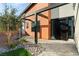 Modern front entry with a covered patio and drought-tolerant landscaping at 6385 Leeland Ct, Las Vegas, NV 89149