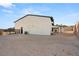 View of home's exterior, backyard, and gated entry at 6385 Leeland Ct, Las Vegas, NV 89149