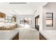 Bright kitchen with white quartz countertops and light wood cabinets at 6385 Leeland Ct, Las Vegas, NV 89149